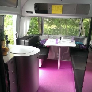 We might just need to have a purple floor, like this brand spanking new Airstream has, in our future rehabbed trailer. Or not. 
